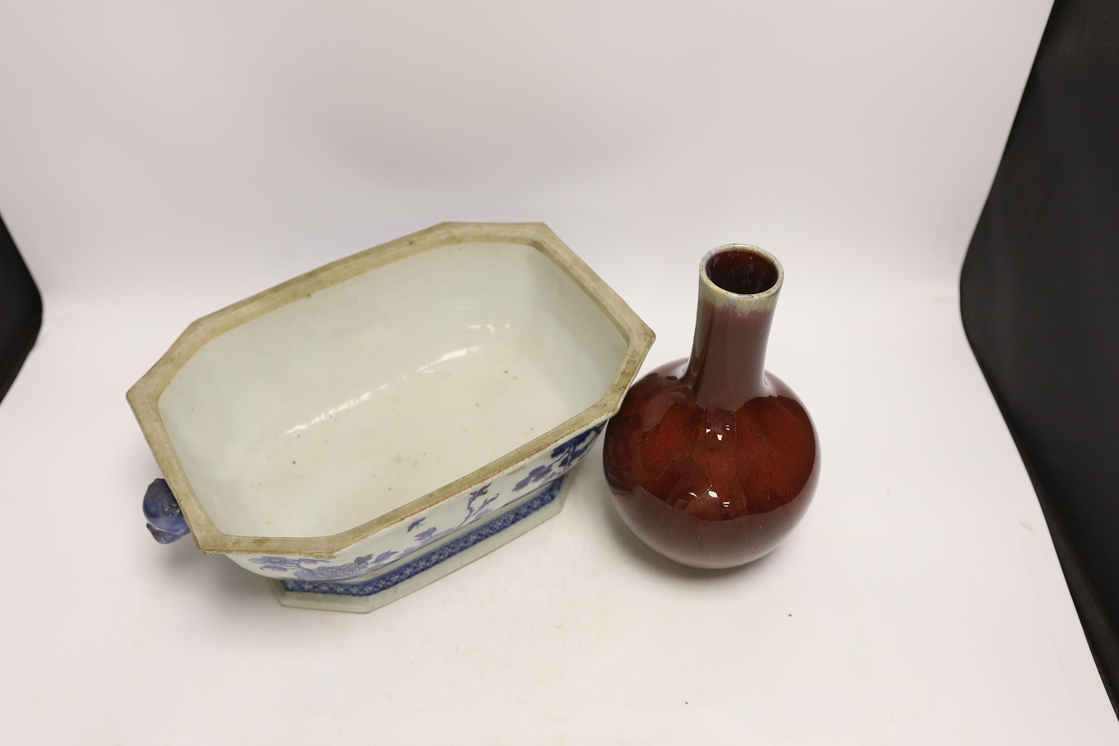 An 18th century Chinese blue and white tureen together with a sang de boeuf vase